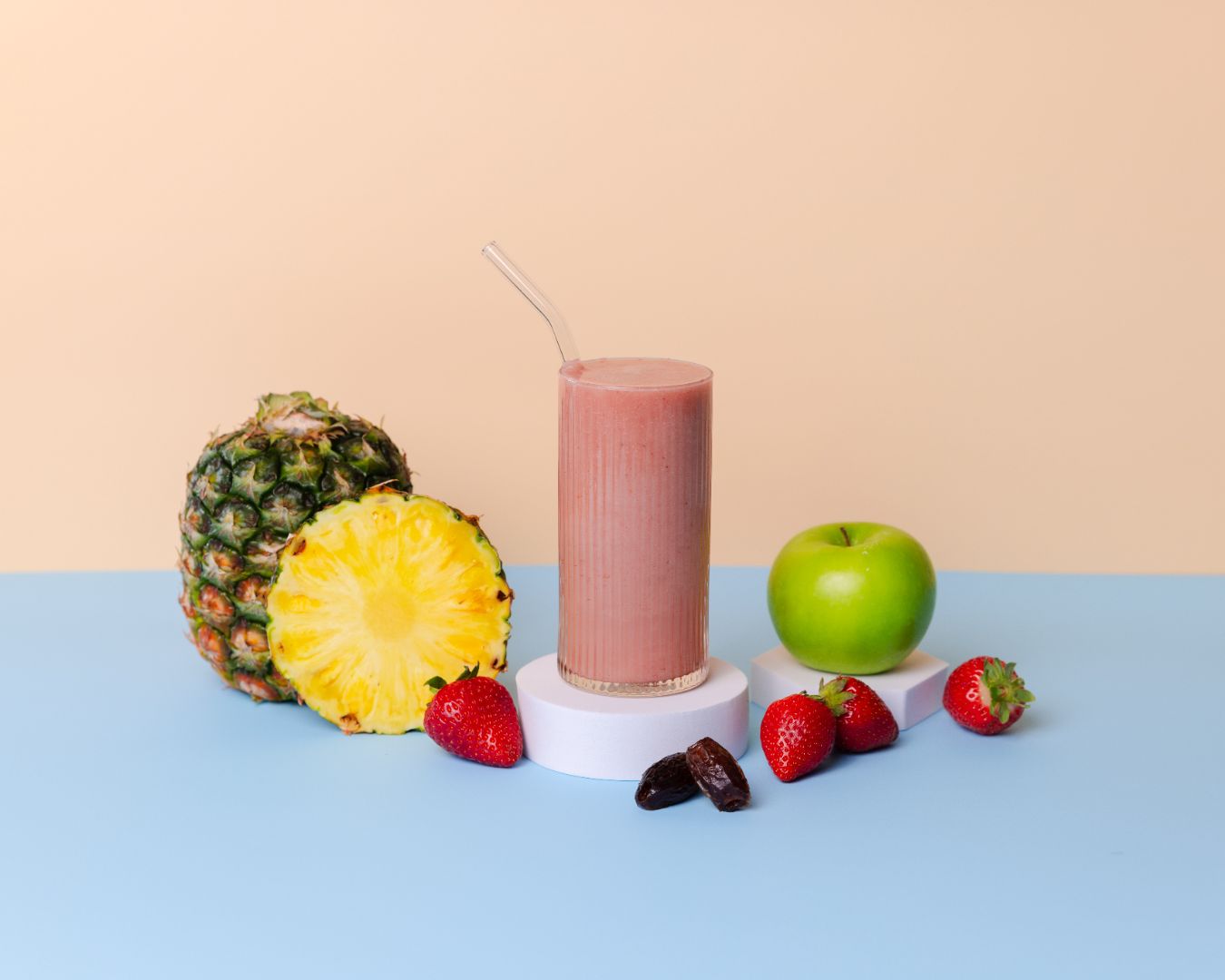 Healthy smoothie made with Energise ready-to-blend pack and ingredients on table